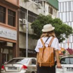 Travel Luggage - View of a Woan on City Street