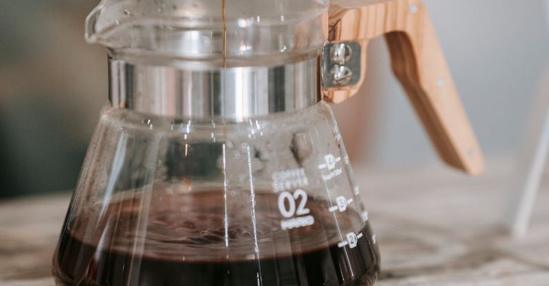 Specialty Coffee - Clear Glass Jar With Black Liquid Inside