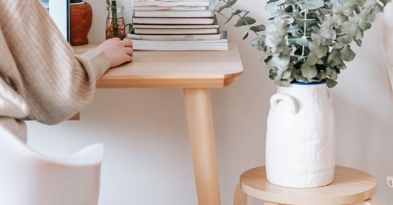 Online Thrifting - Anonymous woman working on laptop in room