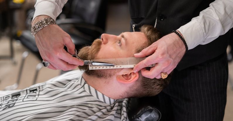 Grooming Tools - Man in Black Suit Holding Mans Face