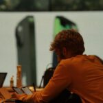 Gadgets Store - Man Holding Smartphones