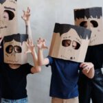 DIY Fashion - A Family Wearing a Diy Cardboard Box Mask