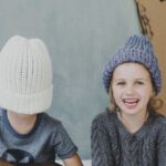 DIY Kids - Kids Playing Cardboard Guitar Sitting on Floor