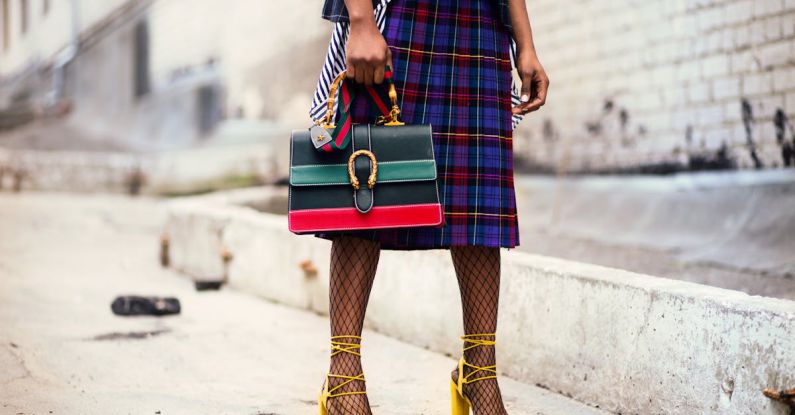 Fashion Week - Woman Holding Leather Handbag