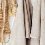 Sustainable Beauty - Set of body care tools with towels on hanger