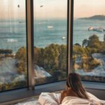 Cozy Bedroom - Woman Laying Down on Bed Inside Room