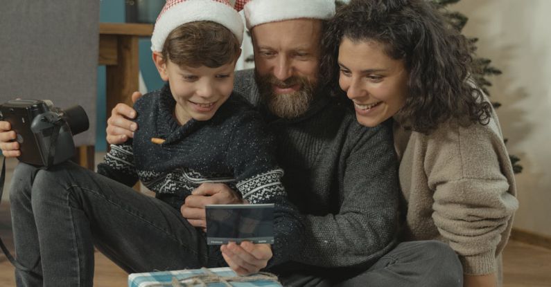 Tech Gifts - A Family Looking at a Photograph
