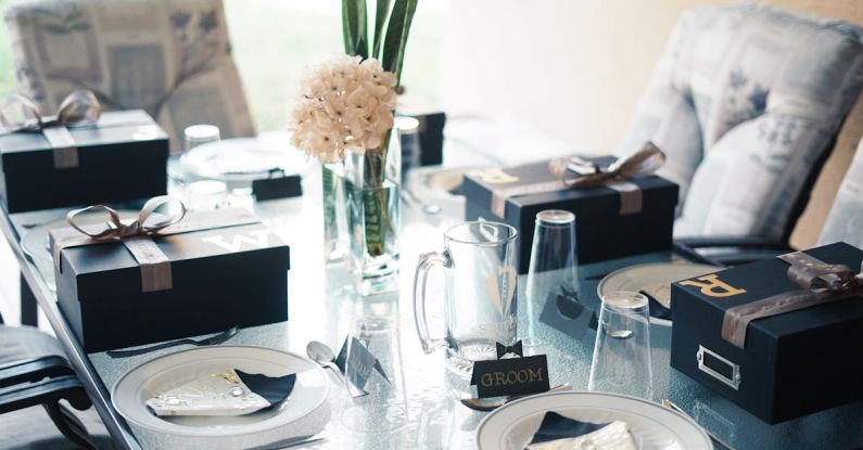 Luxury Gifts - White Petaled Flower in Clear Glass Flower Vase on Table