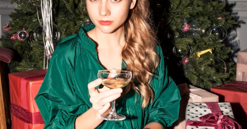 Beauty Gifts - Woman Holding A Glass Of Drink