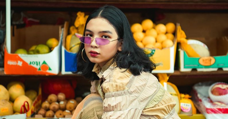 Autumn Sale - Woman Sitting Near Variety of Fruits