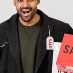 Winter Deals - Man Feeling Happy With His Gray Coat On Sale