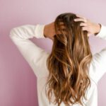 Hair Care - Woman Wearing White Long-sleeved Shirt