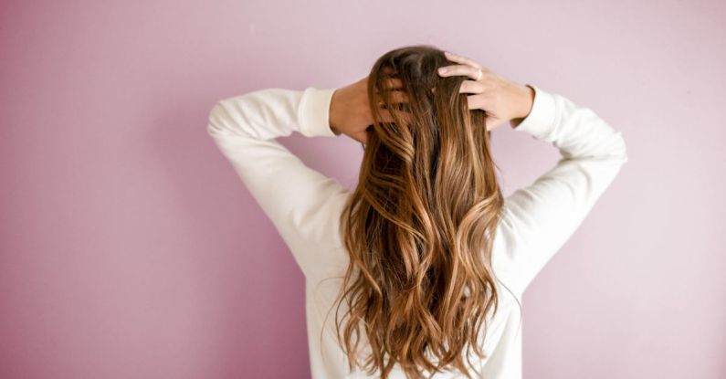 Hair Care - Woman Wearing White Long-sleeved Shirt